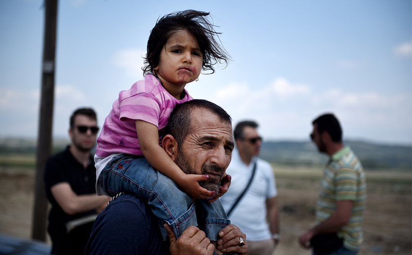 Image of man with child on his shoulder